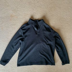 Greg Norman pullover.